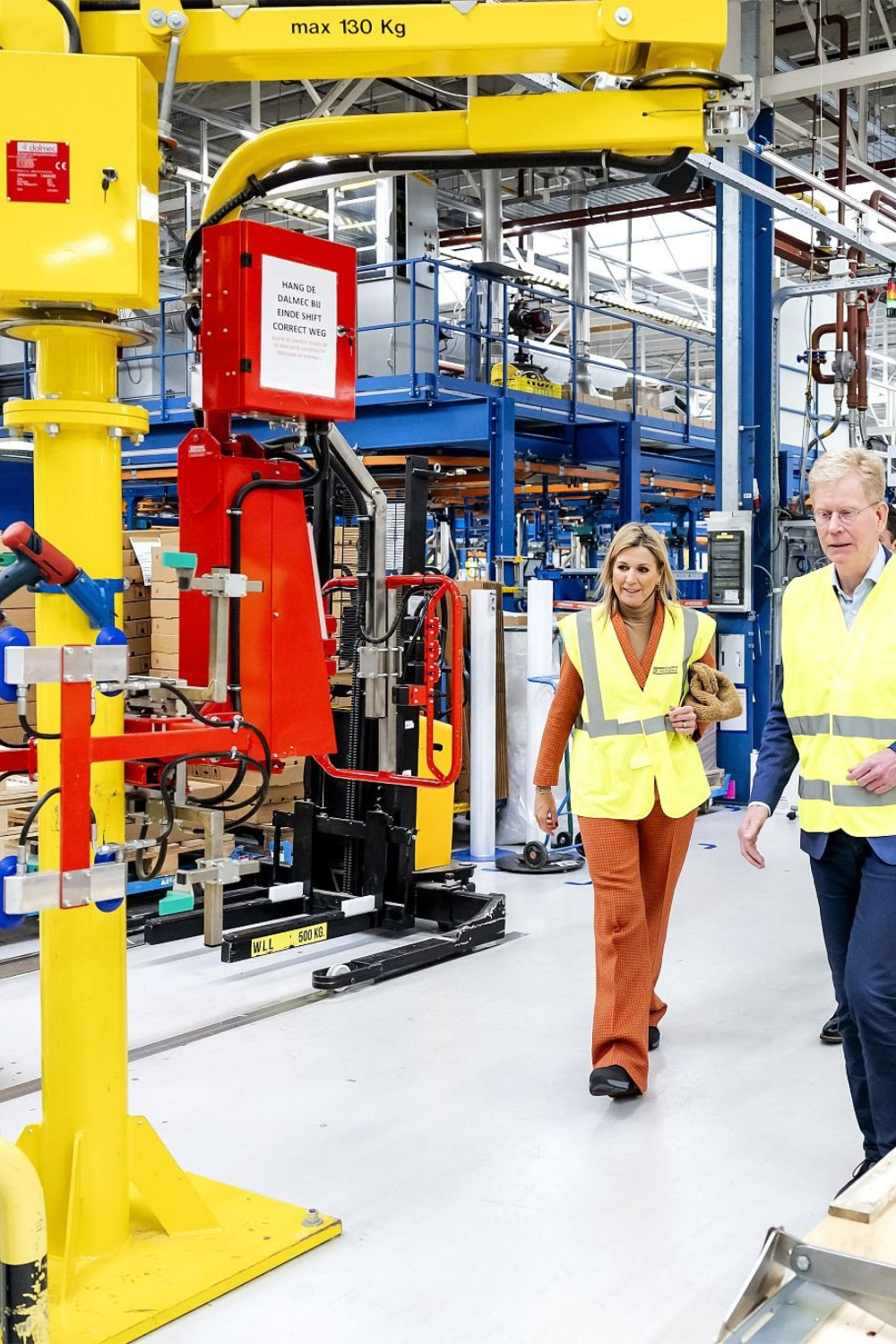 Queen Maxima's Smart Style: Natan Suit and Mango Clutch for Energy Transition Visit Queen Maxima's Style at the Remeha Factory in Apeldoorn