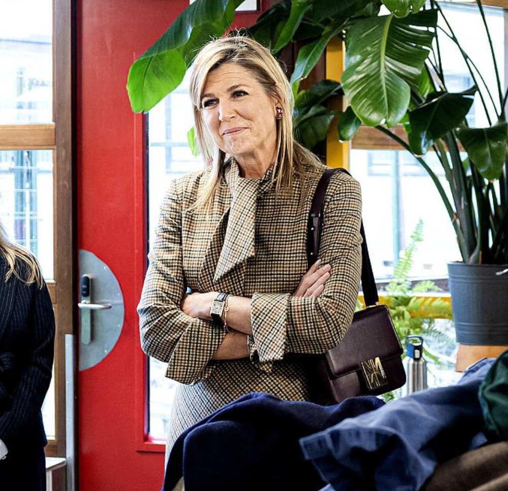 Queen Maxima Rewears Natan Houndstooth Dress & Red Boots Queen Maxima chose a recycled Natan dress