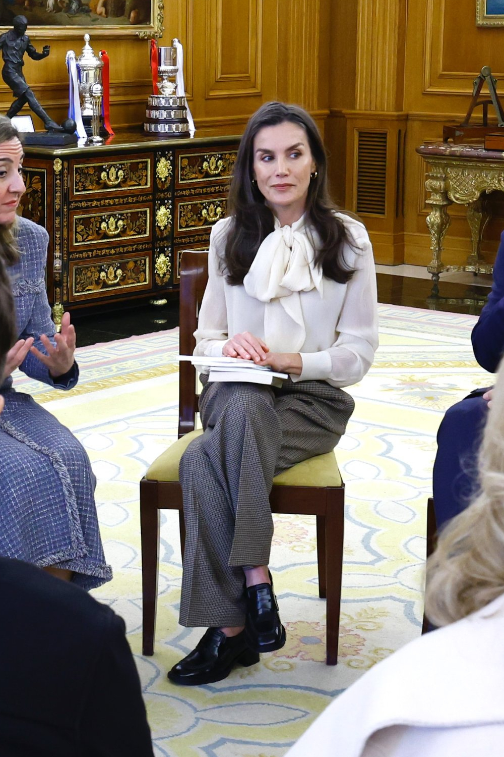Queen Letizia's Look at Zarzuela: Lace-Up Blouse and Checked Trousers Queen Letizia's Zarzuela Outfit