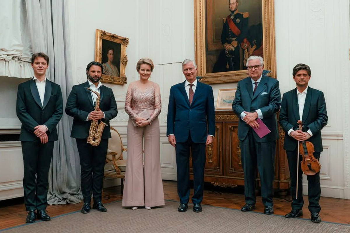 Queen Mathilde's Style at the Spring Concert: A Jumpsuit with an Embroidered Bodice King Philippe and Queen Mathilde with Prince Laurent and the Fratres Trio.