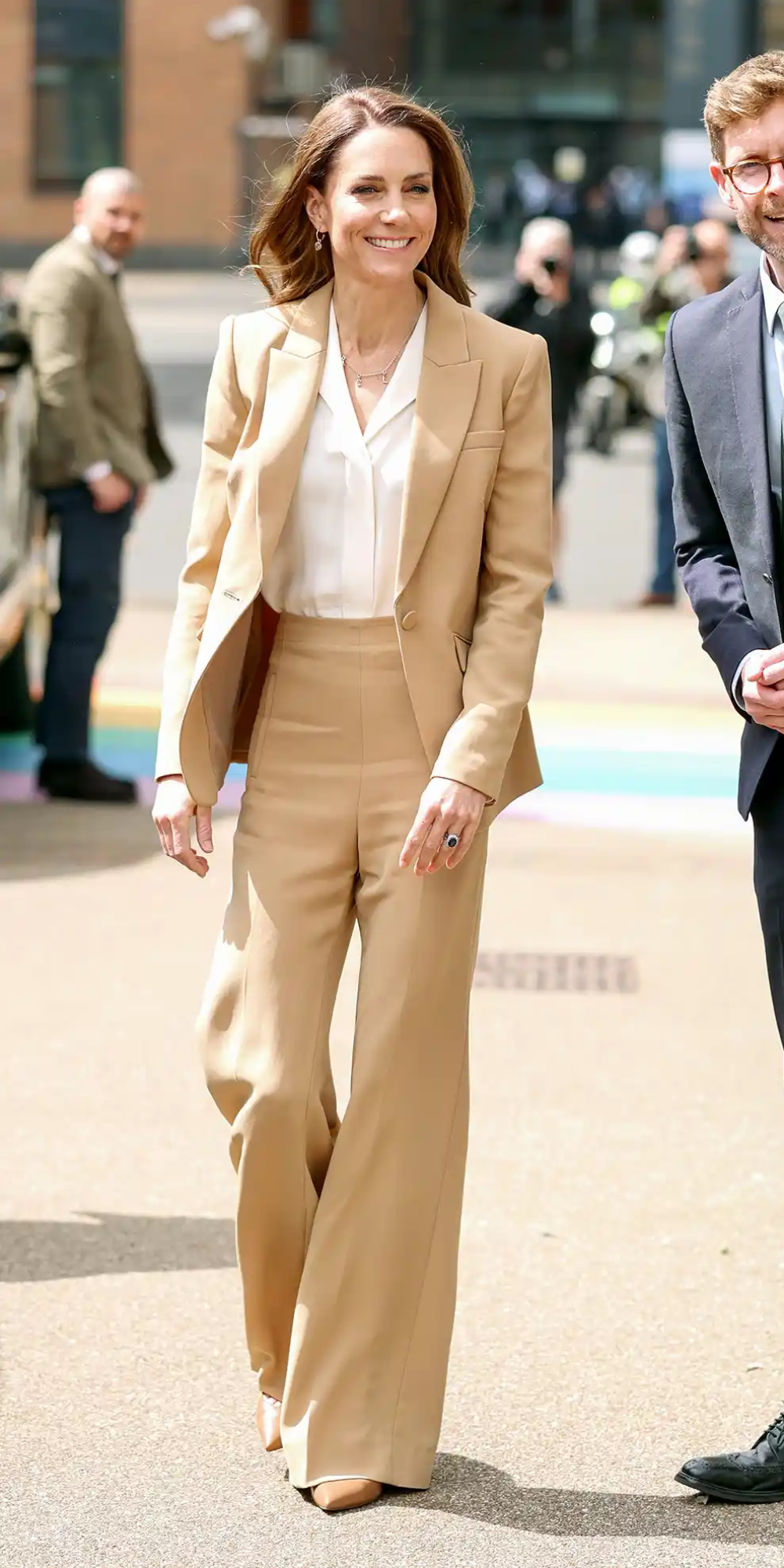 Princess Kate Makes a Comeback in a Gold Suit by Roland Mouret Princess Kate wears a gold suit by Roland Mouret.