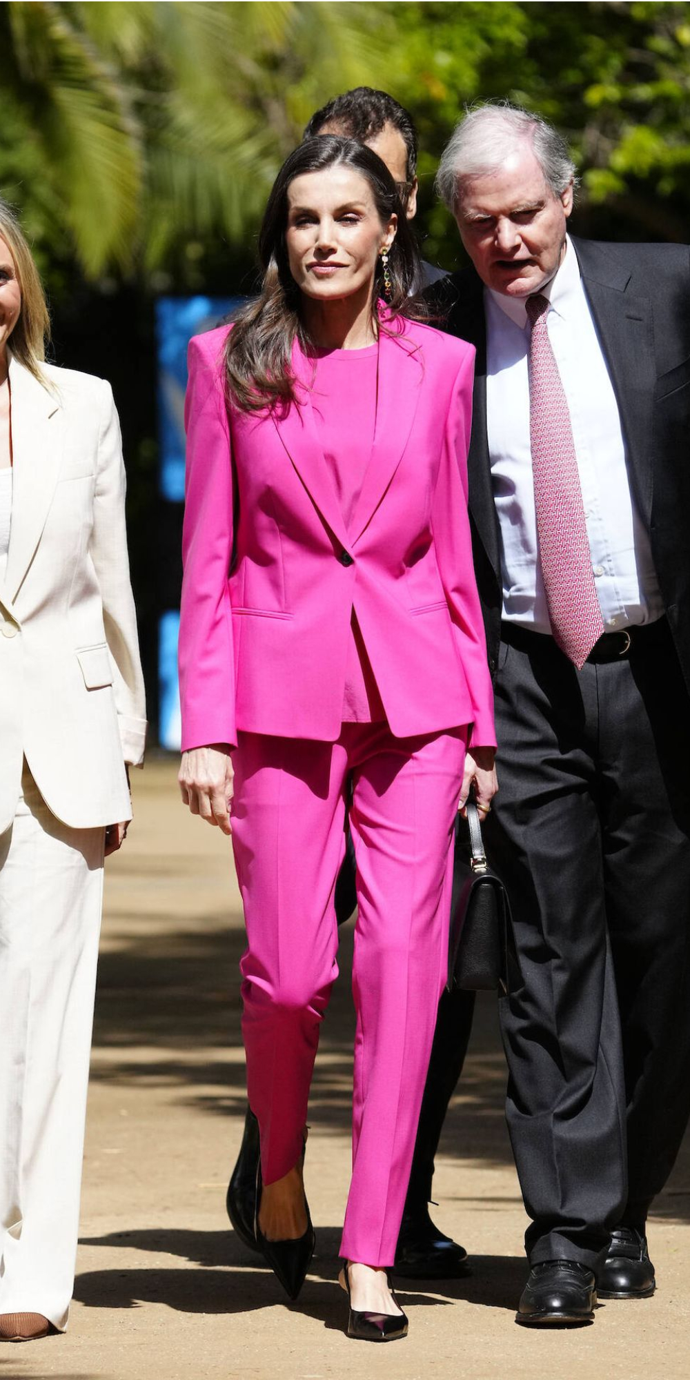 Queen Letizia Embraces the Monochrome Trend With a Bold Head-to-Toe Fuchsia Suit in Granada Queen Letizia's fuchsia suit