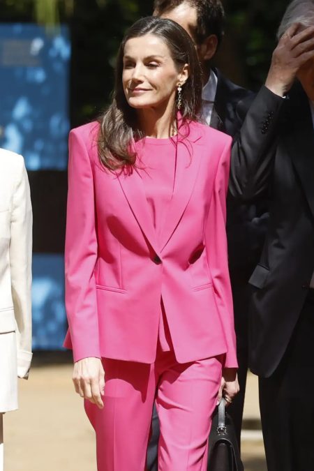 Queen Letizia Embraces the Monochrome Trend With a Bold Head-to-Toe Fuchsia Suit in Granada Queen Letizia Stuns in Fuchsia Suit