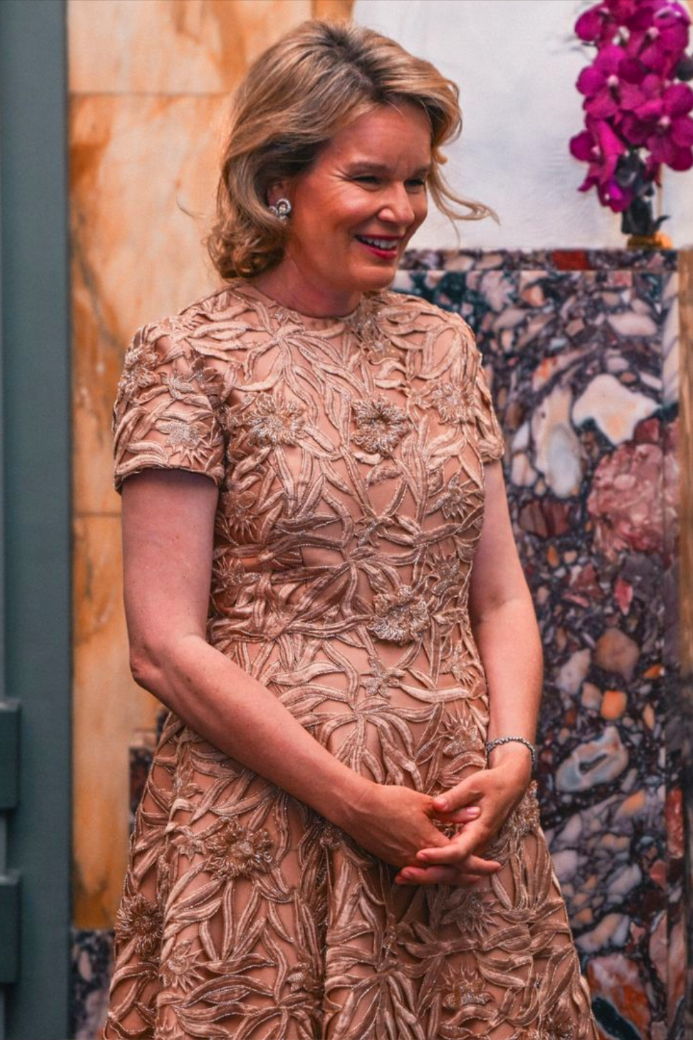 Queen Mathilde's Style at the Queen Elisabeth Cello Competition Mathilde attended the Queen Elisabeth Competition finale in an elegant embroidered dress.