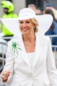 Queen Maxima Wears a White Claes Iversen Suit With Green Sequins in the Rain at State of Fashion Queen Maxima's Style at the State of Fashion in Arnhem