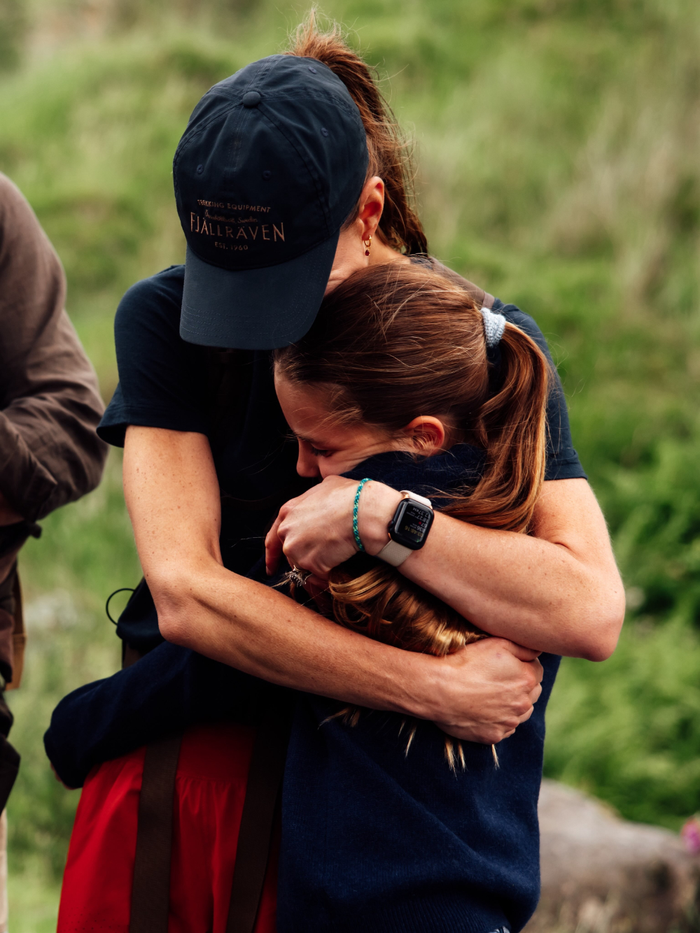 Why Did Kate Middleton Take On The Three Peaks Challenge? Kate hugs her daughter Charlotte.