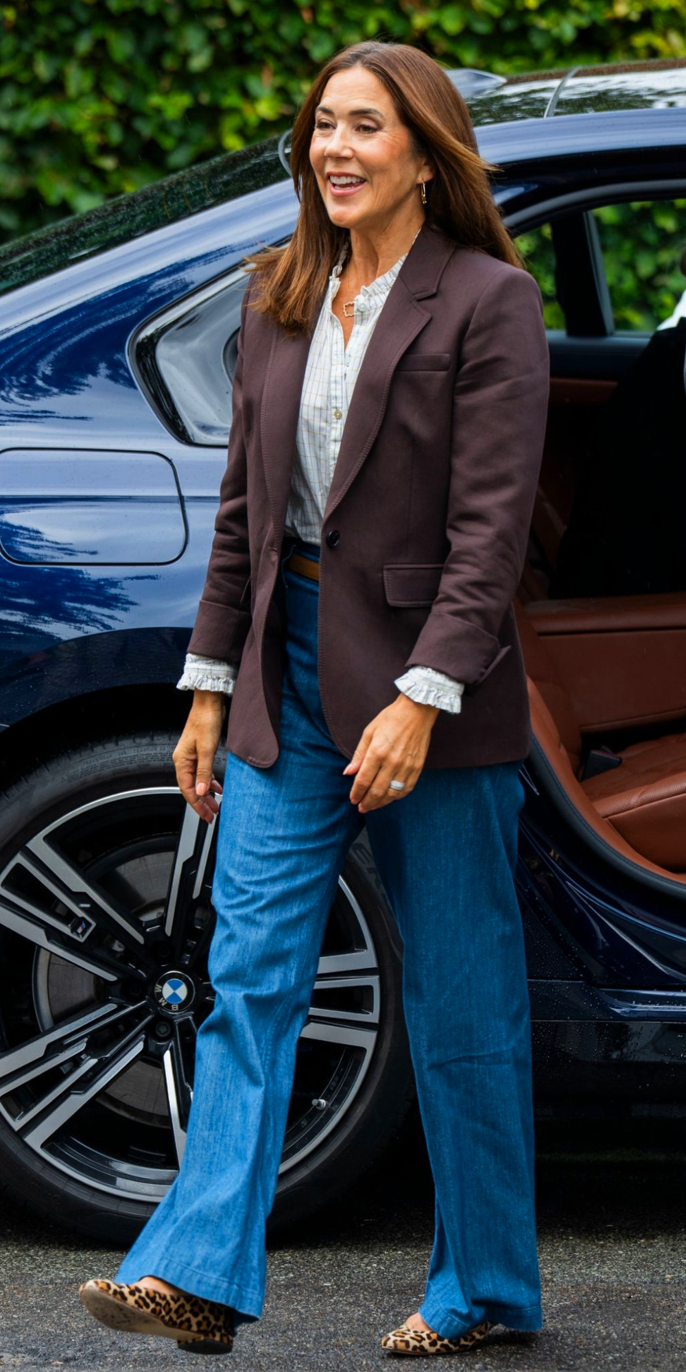 Queen Mary Opts for an Autumnal Look for Her Return to Work Queen Mary Stuns in Chic Wide-Leg Jeans and Blazer