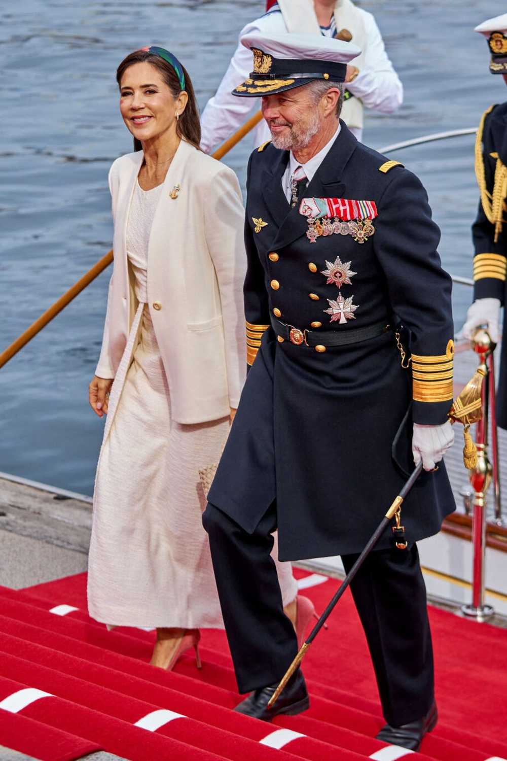 Queen Mary Gives Her Copenhagen Look a Chic Nautical Touch The kings of Denmark after the landing.