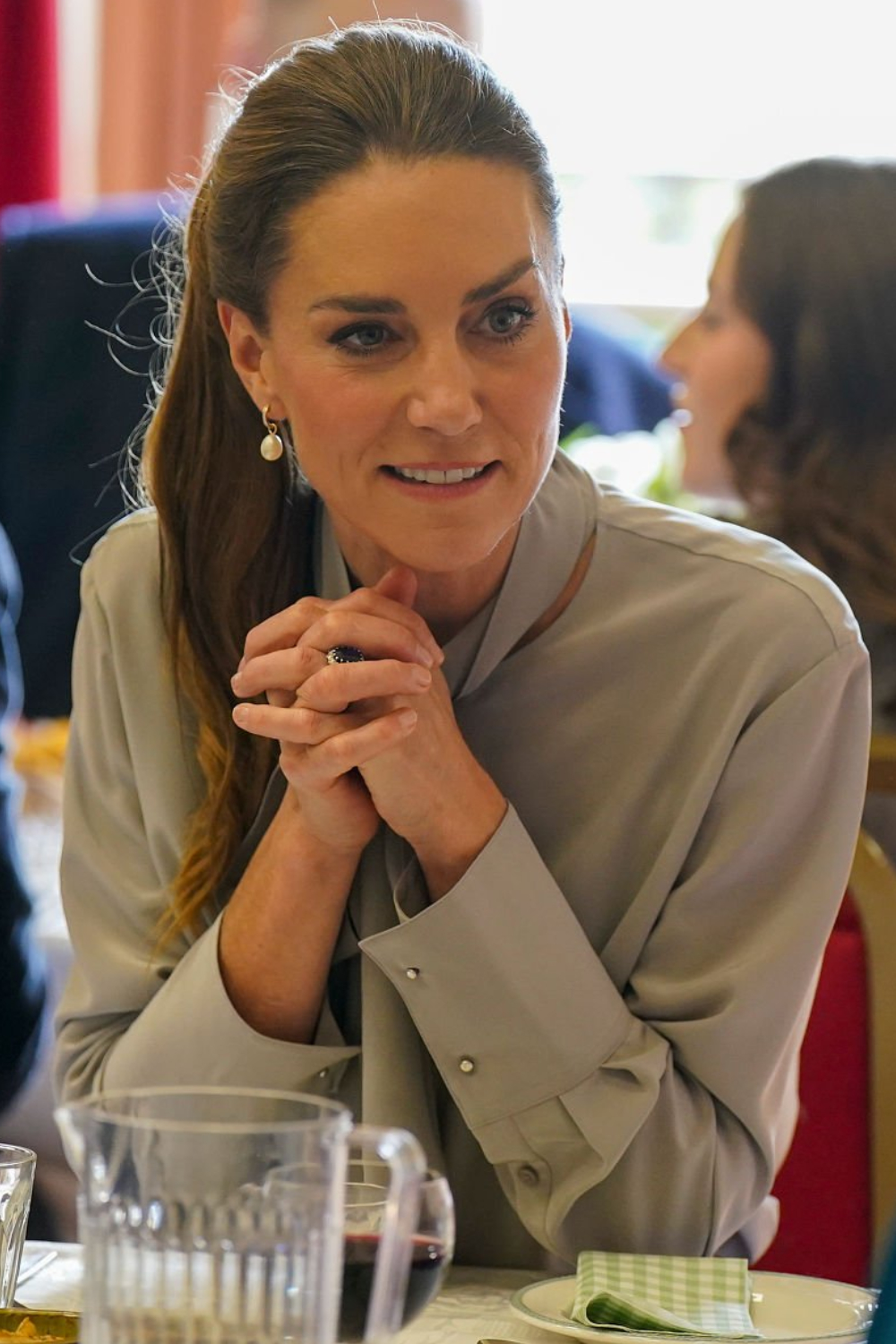 Kate Middleton Pairs Classic Tailoring With Burgundy Accents for a West Sussex Visit Princess of Wales Kate Middleton